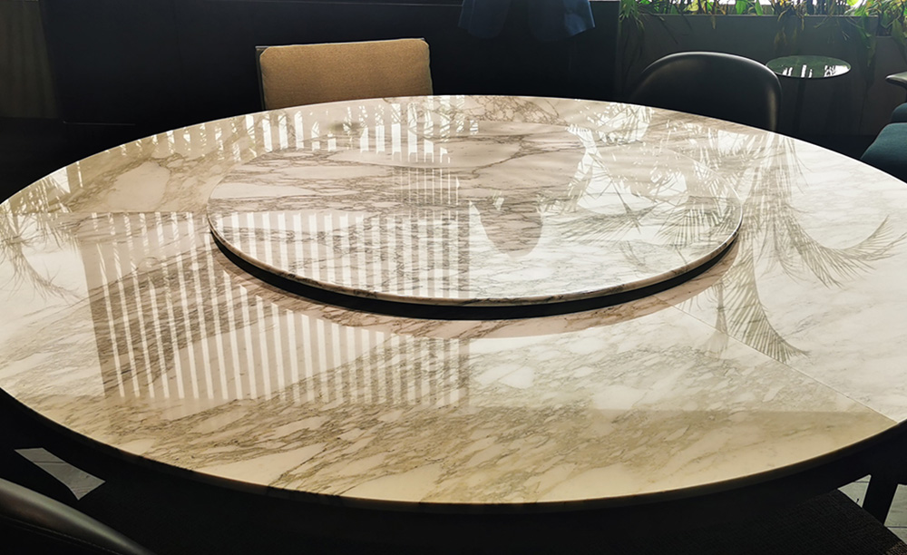 What Makes a Round Marble Dining Table the Perfect Choice for Your Dining Room?